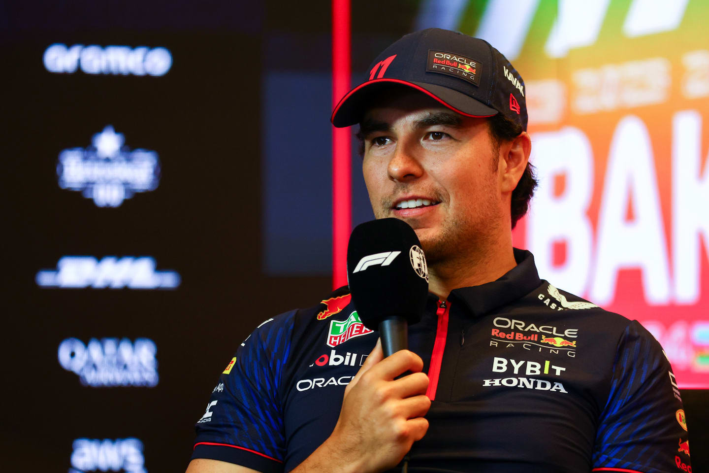 BAKU, AZERBAIJAN - APRIL 27: Sergio Perez of Mexico and Oracle Red Bull Racing talks in a press conference during previews ahead of the F1 Grand Prix of Azerbaijan at Baku City Circuit on April 27, 2023 in Baku, Azerbaijan. (Photo by Bryn Lennon/Getty Images)