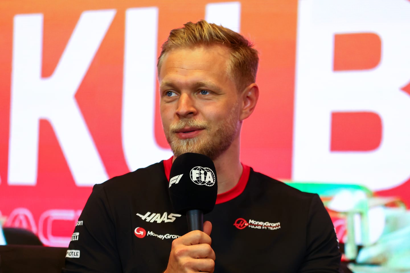 BAKU, AZERBAIJAN - APRIL 27: Kevin Magnussen of Denmark and Haas F1 talks in a press conference during previews ahead of the F1 Grand Prix of Azerbaijan at Baku City Circuit on April 27, 2023 in Baku, Azerbaijan. (Photo by Bryn Lennon/Getty Images)