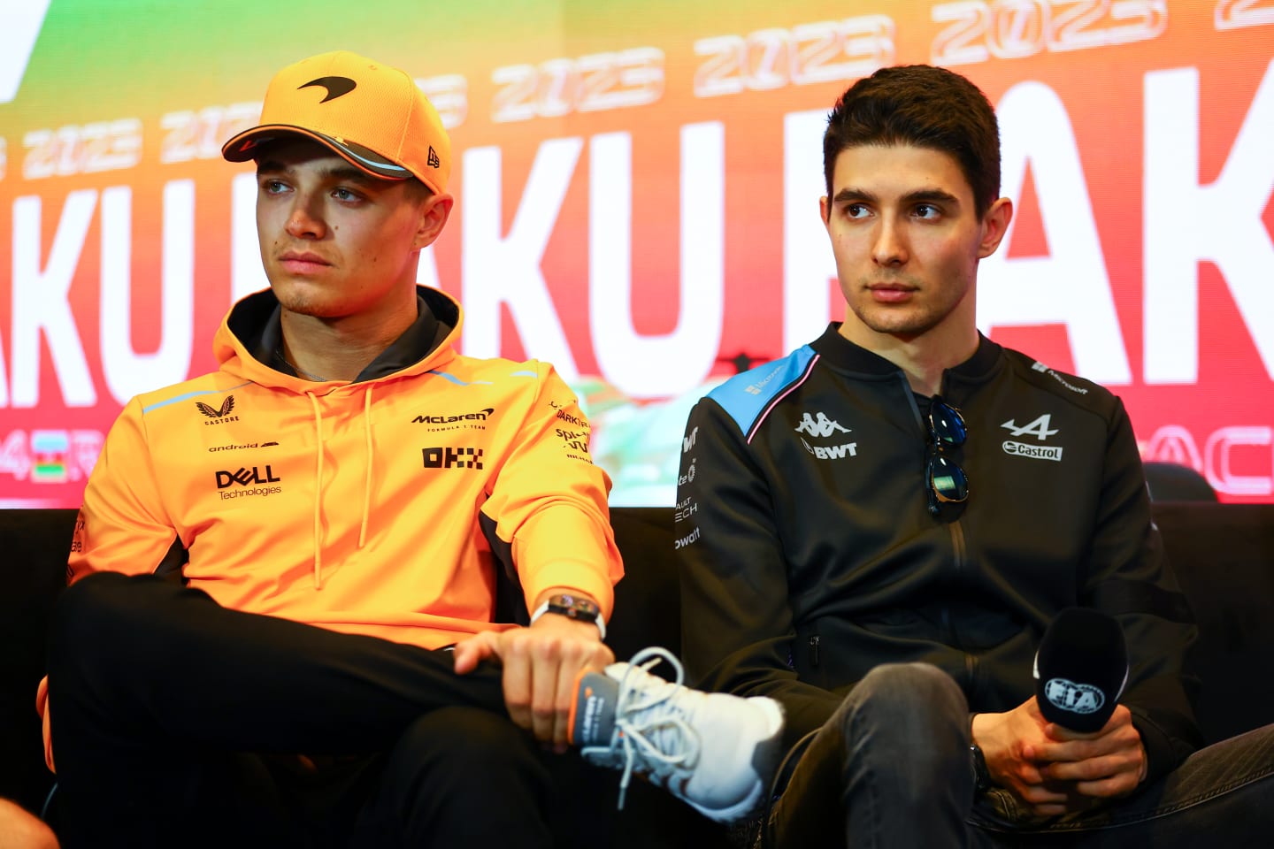 BAKU, AZERBAIJAN - APRIL 27: Lando Norris of Great Britain and McLaren and Esteban Ocon of France and Alpine F1 talk in a press conference during previews ahead of the F1 Grand Prix of Azerbaijan at Baku City Circuit on April 27, 2023 in Baku, Azerbaijan. (Photo by Bryn Lennon/Getty Images)