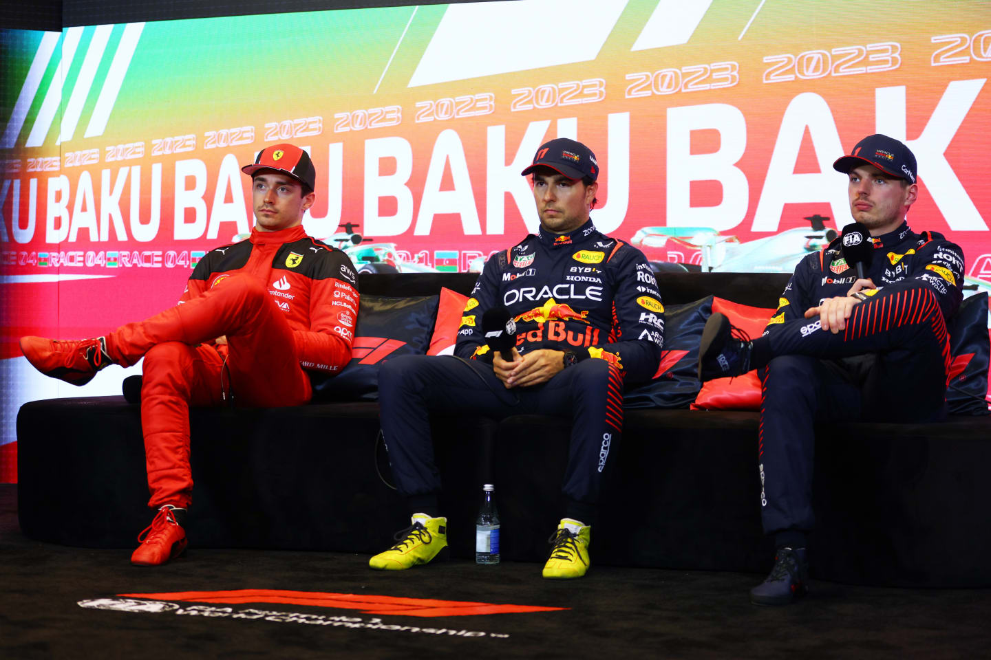 BAKU, AZERBAIJAN - APRIL 29: Sprint winner Sergio Perez of Mexico and Oracle Red Bull Racing (C),