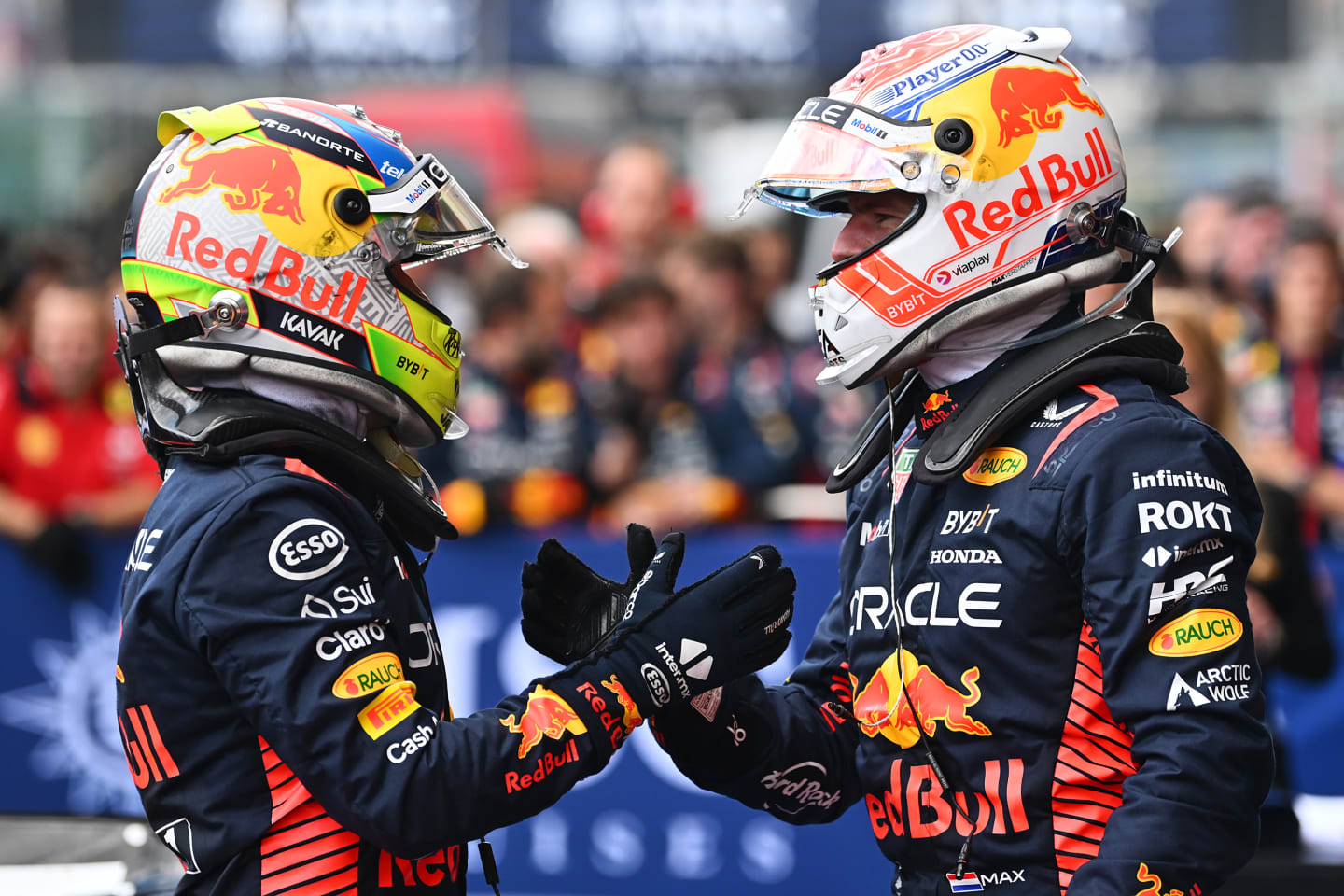 SPA, BELGIUM - JULY 30: Race winner Max Verstappen of the Netherlands and Oracle Red Bull Racing and Second placed Sergio Perez of Mexico and Oracle Red Bull Racing talk in parc ferme during the F1 Grand Prix of Belgium at Circuit de Spa-Francorchamps on July 30, 2023 in Spa, Belgium. (Photo by Dan Mullan/Getty Images)