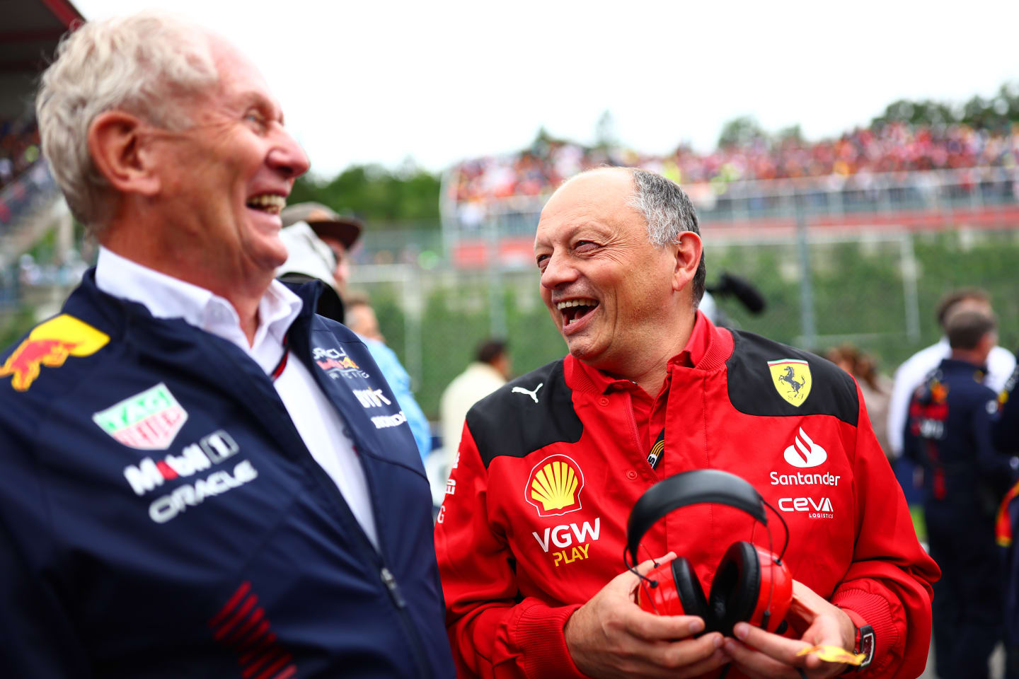 SPA, BELGIUM - JULY 30: Ferrari Team Principal Frederic Vasseur talks with Red Bull Racing Team