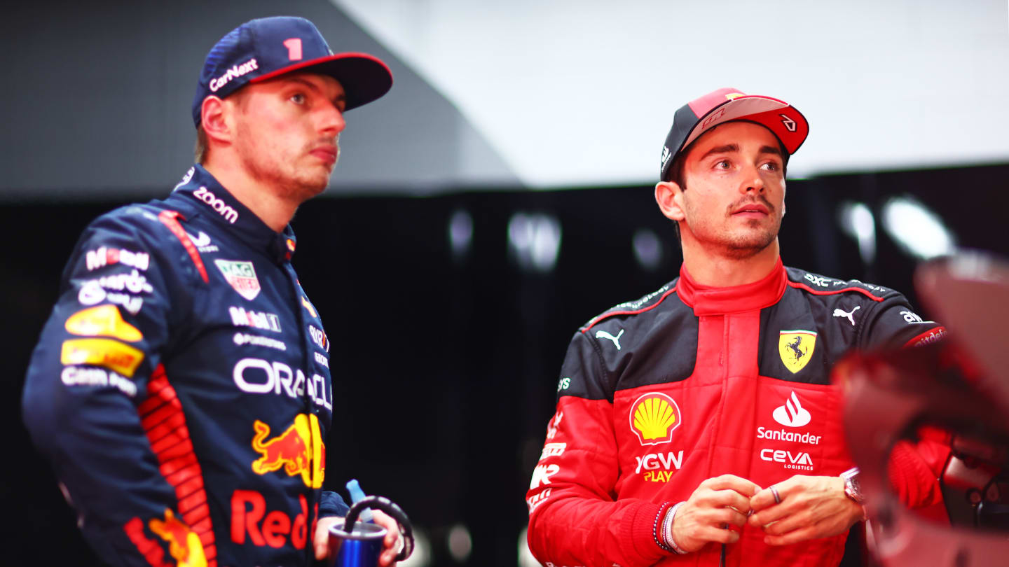 SAO PAULO, BRAZIL - NOVEMBER 03: Second placed qualifier Charles Leclerc of Monaco and Ferrari and Pole position qualifier Max Verstappen of the Netherlands and Oracle Red Bull Racing look on in the FIA Garage after qualifying ahead of the F1 Grand Prix of Brazil at Autodromo Jose Carlos Pace on November 03, 2023 in Sao Paulo, Brazil. (Photo by Dan Istitene - Formula 1/Formula 1 via Getty Images)