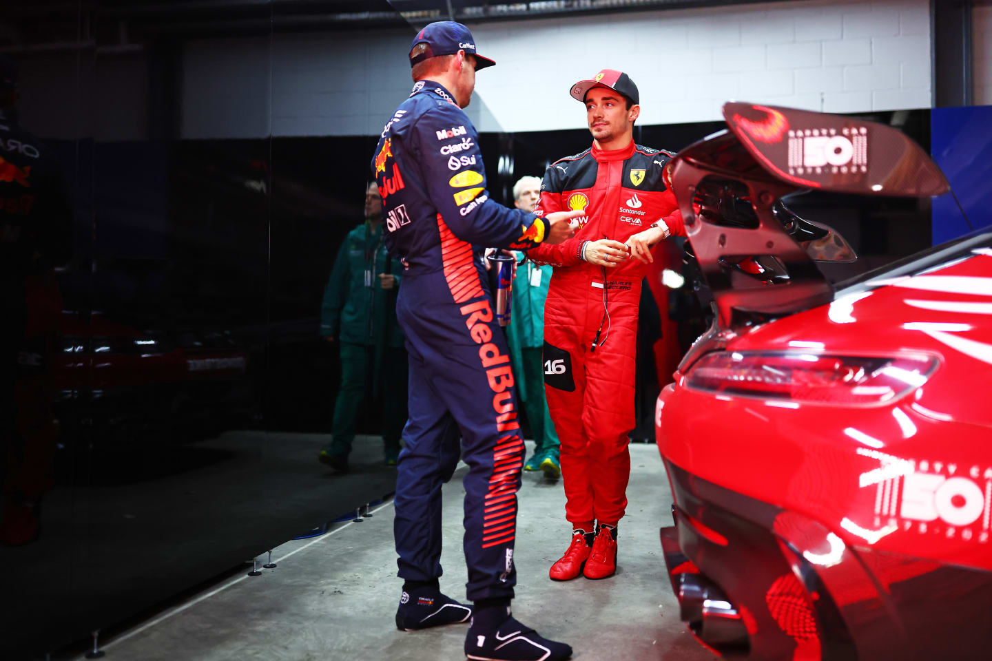 SAO PAULO, BRAZIL - NOVEMBER 03: Second placed qualifier Charles Leclerc of Monaco and Ferrari talks with Pole position qualifier Max Verstappen of the Netherlands and Oracle Red Bull Racing in the FIA Garage after qualifying ahead of the F1 Grand Prix of Brazil at Autodromo Jose Carlos Pace on November 03, 2023 in Sao Paulo, Brazil. (Photo by Dan Istitene - Formula 1/Formula 1 via Getty Images)