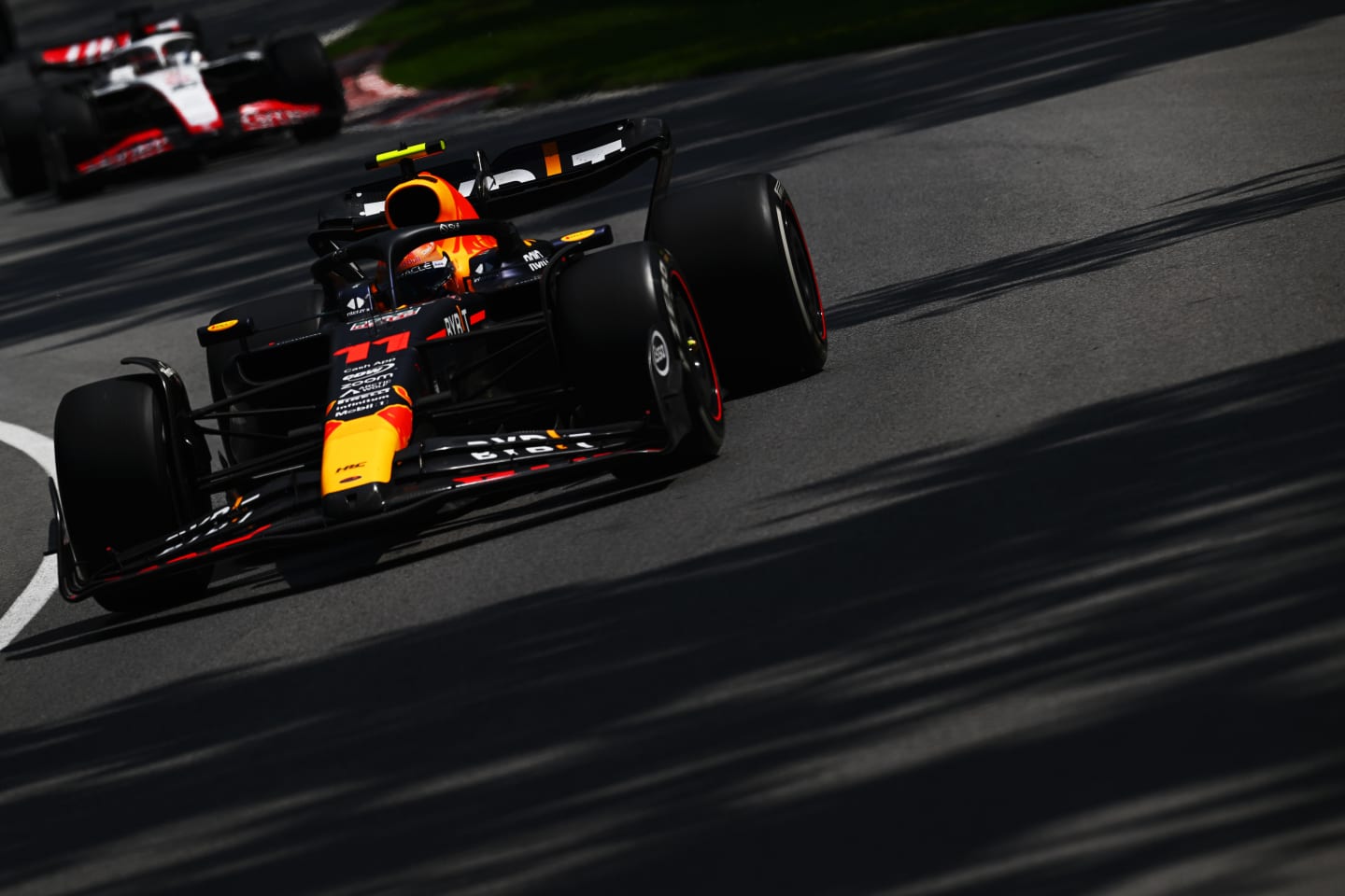 MONTREAL, QUEBEC - JUNE 18: Sergio Perez of Mexico driving the (11) Oracle Red Bull Racing RB19 on