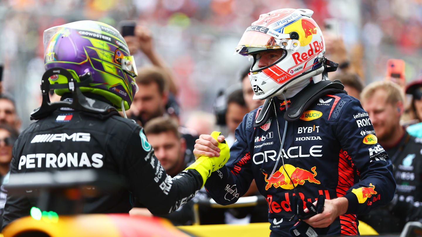 MONTREAL, QUEBEC - JUNE 18: Third placed Lewis Hamilton of Great Britain and Mercedes and Race winner Max Verstappen of the Netherlands and Oracle Red Bull Racing celebrate in parc ferme during the F1 Grand Prix of Canada at Circuit Gilles Villeneuve on June 18, 2023 in Montreal, Quebec. (Photo by Dan Istitene - Formula 1/Formula 1 via Getty Images)