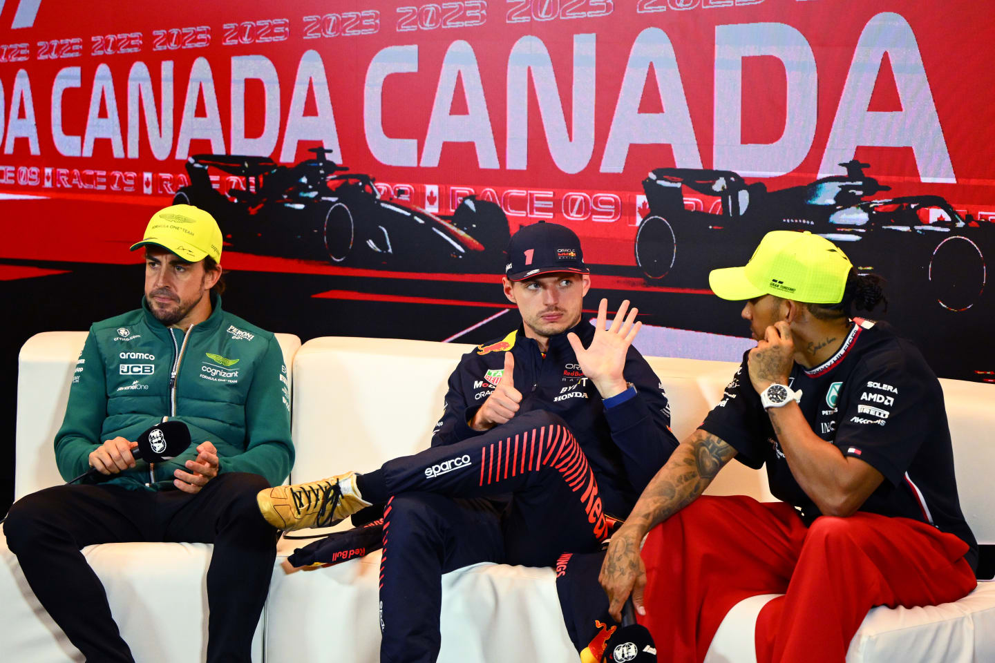 MONTREAL, QUEBEC - JUNE 18: Second placed Fernando Alonso of Spain and Aston Martin F1 Team and