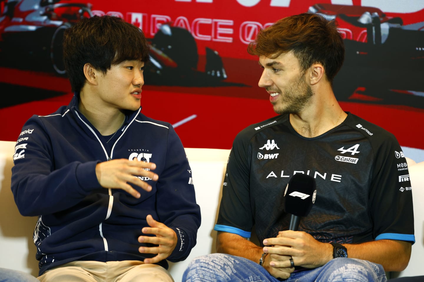 MONTREAL, QUEBEC - JUNE 15: Yuki Tsunoda of Japan and Scuderia AlphaTauri and Pierre Gasly of France and Alpine F1 talk in the Drivers Press Conference during previews ahead of the F1 Grand Prix of Canada at Circuit Gilles Villeneuve on June 15, 2023 in Montreal, Quebec. (Photo by Jared C. Tilton/Getty Images)