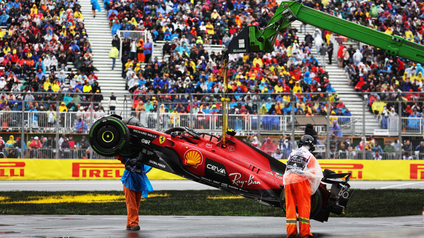 MONTREAL, QUEBEC - JUNE 17: The car of Carlos Sainz of Spain and Ferrari is recovered from the circuit after a crash during final practice ahead of the F1 Grand Prix of Canada at Circuit Gilles Villeneuve on June 17, 2023 in Montreal, Quebec. (Photo by Bryn Lennon - Formula 1/Formula 1 via Getty Images)