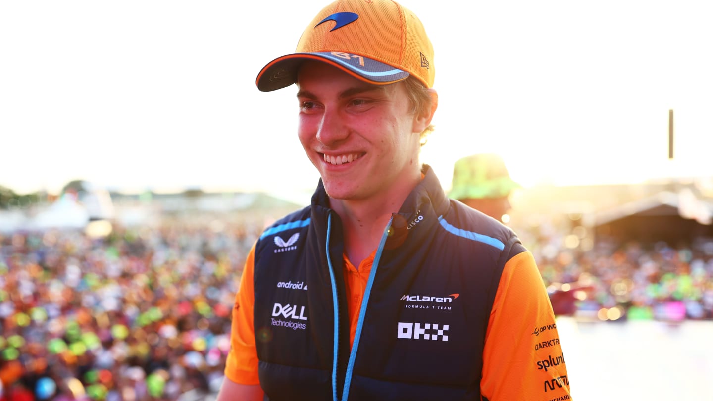 NORTHAMPTON, ENGLAND - JULY 09: 4th placed Oscar Piastri of Australia and McLaren talks to the