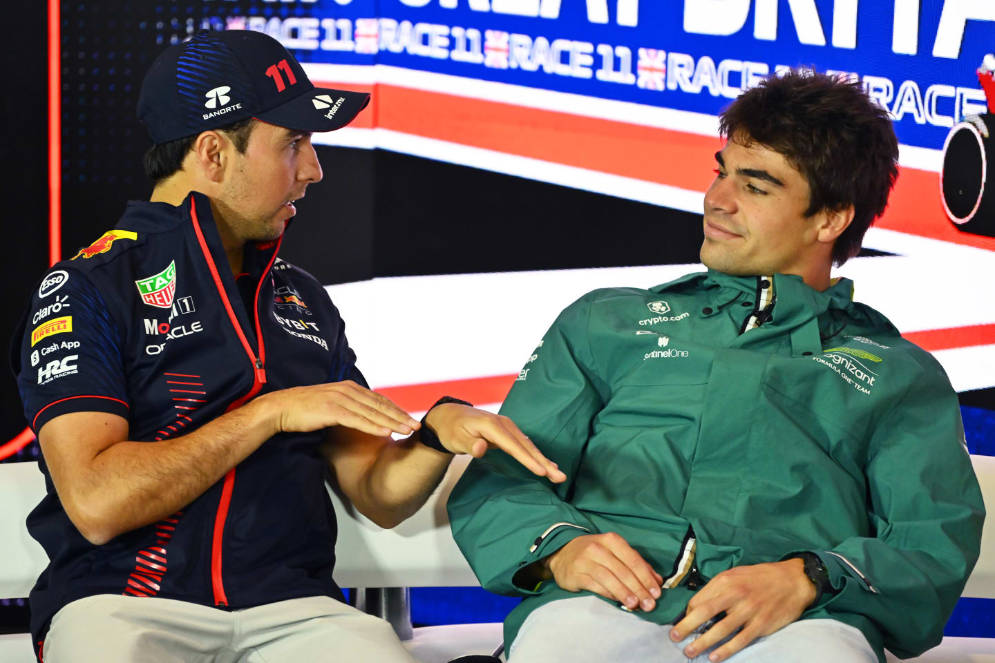 NORTHAMPTON, ENGLAND - JULY 06: Sergio Perez of Mexico and Oracle Red Bull Racing and Lance Stroll