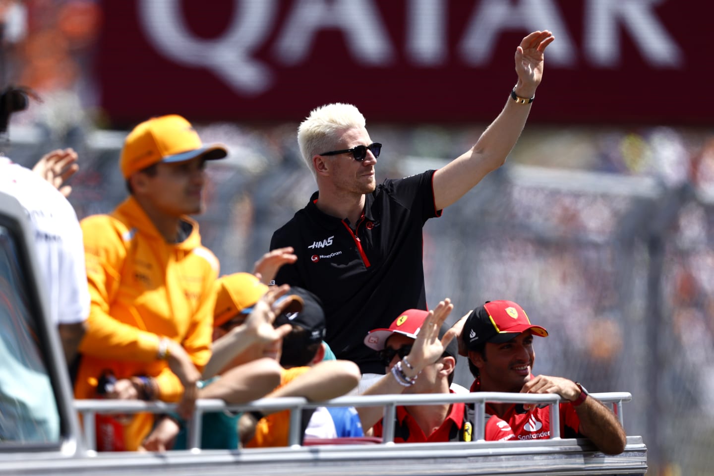 BUDAPEST, HUNGARY - JULY 23: Nico Hulkenberg of Germany and Haas F1 waves to the crowd on the drivers parade prior to the F1 Grand Prix of Hungary at Hungaroring on July 23, 2023 in Budapest, Hungary. (Photo by Francois Nel/Getty Images)