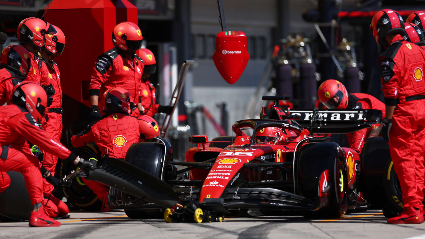 BUDAPEST, HUNGARY - JULY 23: Charles Leclerc of Monaco driving the (16) Ferrari SF-23 makes a pitstop during the F1 Grand Prix of Hungary at Hungaroring on July 23, 2023 in Budapest, Hungary. (Photo by Dan Istitene - Formula 1/Formula 1 via Getty Images)