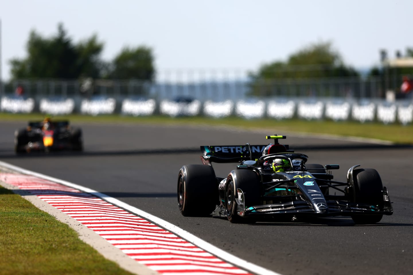 BUDAPEST, HUNGARY - JULY 23: Lewis Hamilton of Great Britain driving the (44) Mercedes AMG Petronas F1 Team W14 on track during the F1 Grand Prix of Hungary at Hungaroring on July 23, 2023 in Budapest, Hungary. (Photo by Bryn Lennon - Formula 1/Formula 1 via Getty Images)