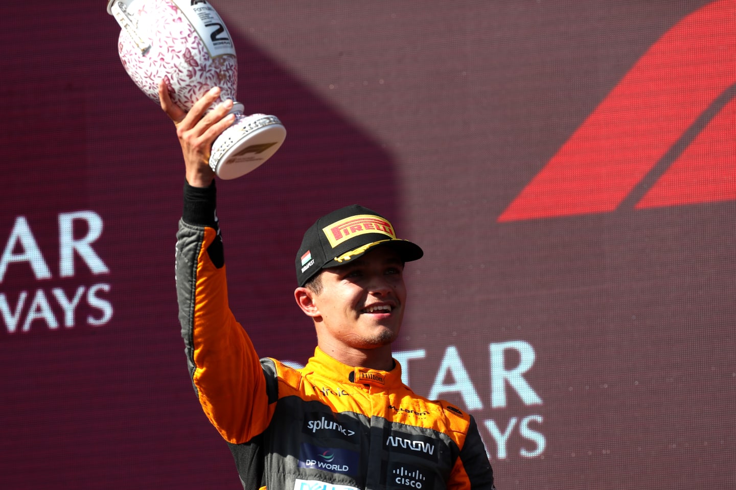 BUDAPEST, HUNGARY - JULY 23: Second placed Lando Norris of Great Britain and McLaren celebrates on the podium during the F1 Grand Prix of Hungary at Hungaroring on July 23, 2023 in Budapest, Hungary. (Photo by Peter Fox/Getty Images)