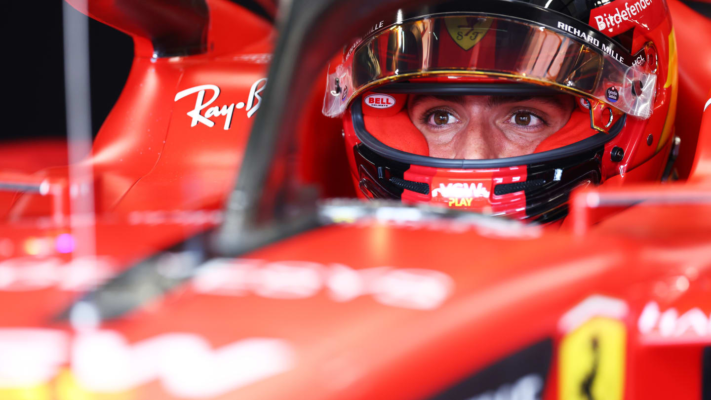 BUDAPEST, HUNGARY - JULY 21: Carlos Sainz of Spain and Ferrari prepares to drive in the garage during practice ahead of the F1 Grand Prix of Hungary at Hungaroring on July 21, 2023 in Budapest, Hungary. (Photo by Dan Istitene - Formula 1/Formula 1 via Getty Images)