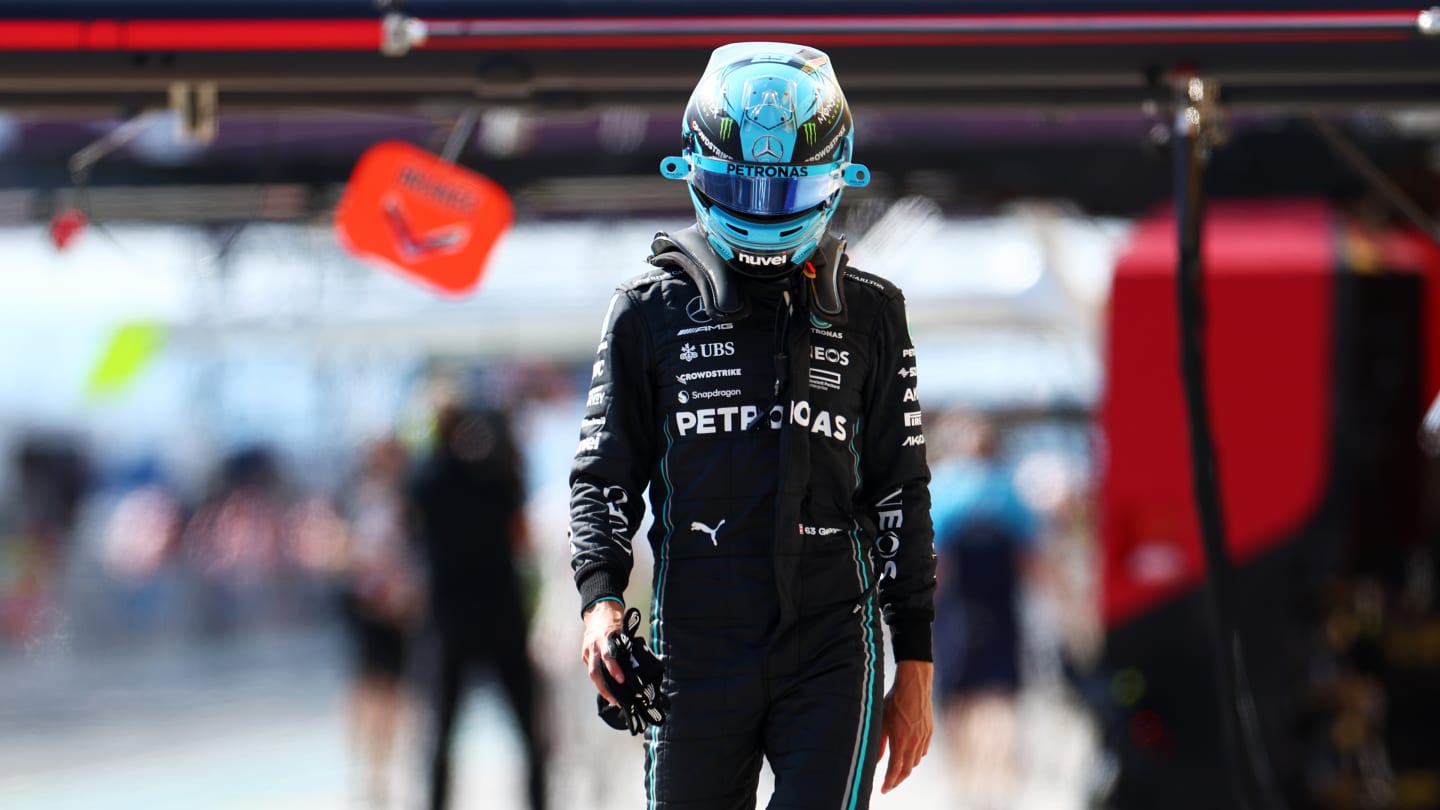 BUDAPEST, HUNGARY - JULY 22: 18th placed qualifier George Russell of Great Britain and Mercedes walks in the Pitlane during qualifying ahead of the F1 Grand Prix of Hungary at Hungaroring on July 22, 2023 in Budapest, Hungary. (Photo by Dan Istitene - Formula 1/Formula 1 via Getty Images)