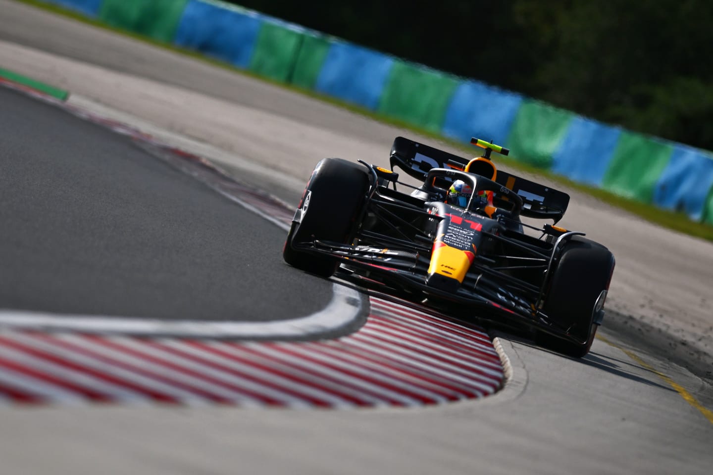 BUDAPEST, HUNGARY - JULY 22: Sergio Perez of Mexico driving the (11) Oracle Red Bull Racing RB19 on track during qualifying ahead of the F1 Grand Prix of Hungary at Hungaroring on July 22, 2023 in Budapest, Hungary. (Photo by Dan Mullan/Getty Images)