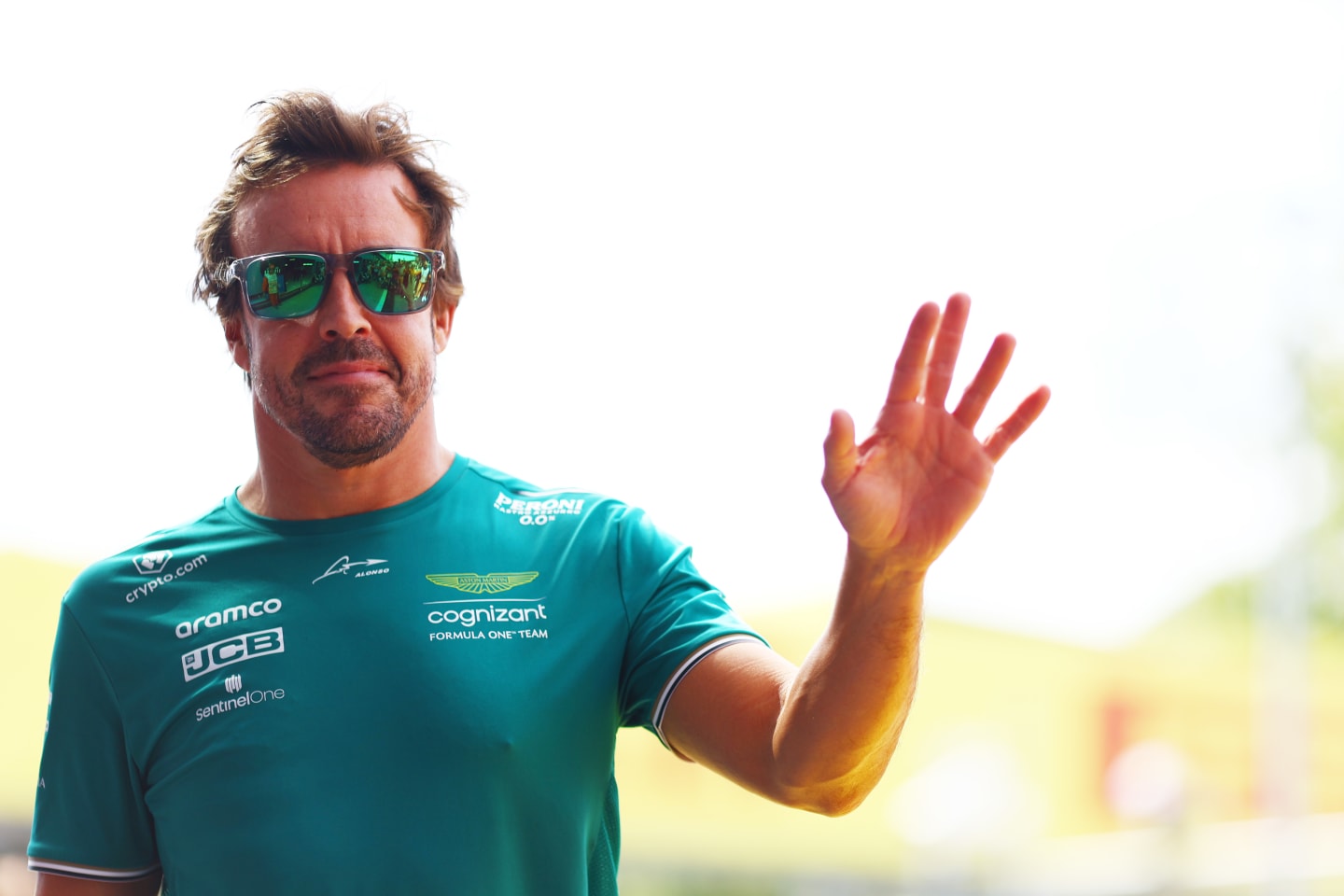 MONZA, ITALY - SEPTEMBER 03: Fernando Alonso of Spain and Aston Martin F1 Team waves to the crowd