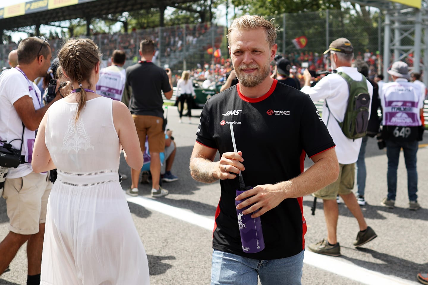 MONZA, ITALY - SEPTEMBER 03: Kevin Magnussen of Denmark and Haas F1 looks on from the drivers parade prior to the F1 Grand Prix of Italy at Autodromo Nazionale Monza on September 03, 2023 in Monza, Italy. (Photo by Ryan Pierse/Getty Images)