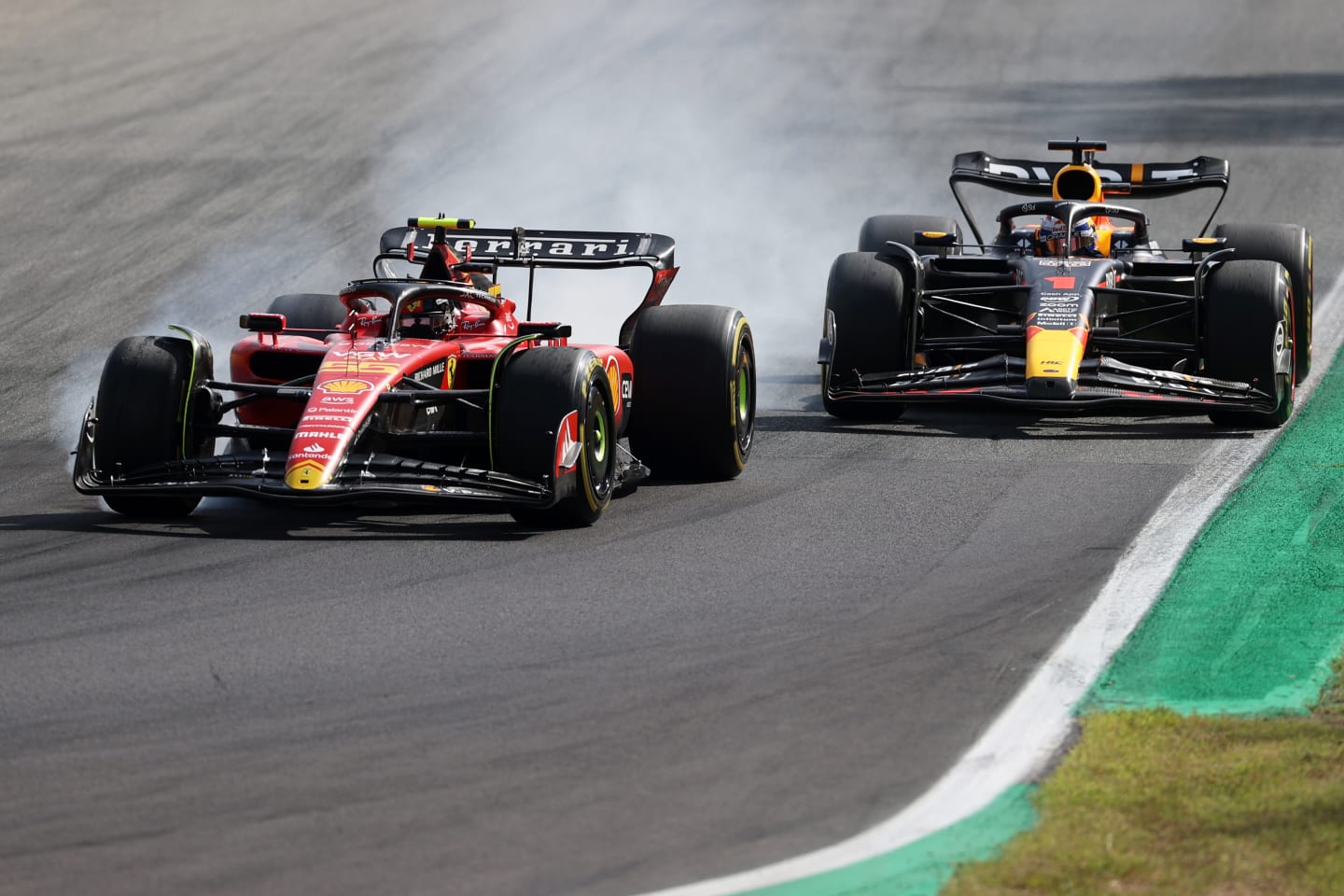 MONZA, ITALY - SEPTEMBER 03: Carlos Sainz of Spain driving (55) the Ferrari SF-23 locks a wheel