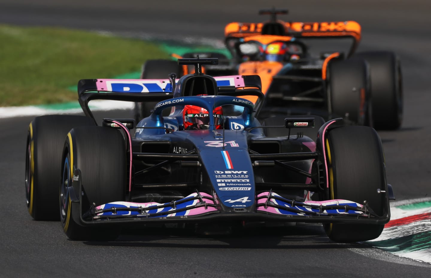 MONZA, ITALY - SEPTEMBER 03: Esteban Ocon of France driving the (31) Alpine F1 A523 Renault leads Oscar Piastri of Australia driving the (81) McLaren MCL60 Mercedes during the F1 Grand Prix of Italy at Autodromo Nazionale Monza on September 03, 2023 in Monza, Italy. (Photo by Peter Fox/Getty Images)