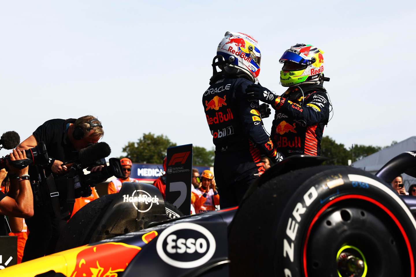 MONZA, ITALY - SEPTEMBER 03: Race winner Max Verstappen of the Netherlands and Oracle Red Bull Racing and Second placed Sergio Perez of Mexico and Oracle Red Bull Racing celebrate in parc ferme during the F1 Grand Prix of Italy at Autodromo Nazionale Monza on September 03, 2023 in Monza, Italy. (Photo by Mark Thompson/Getty Images)