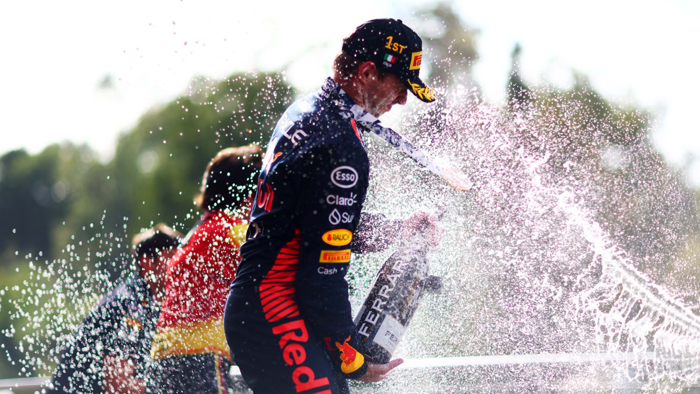 MONZA, ITALY - SEPTEMBER 03: Race winner Max Verstappen of the Netherlands and Oracle Red Bull Racing celebrates on the podium during the F1 Grand Prix of Italy at Autodromo Nazionale Monza on September 03, 2023 in Monza, Italy. (Photo by Dan Istitene - Formula 1/Formula 1 via Getty Images)