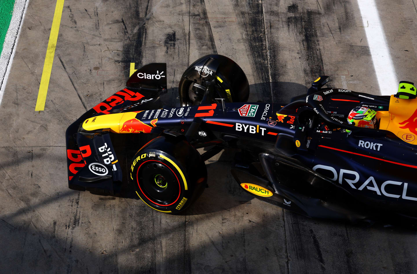 MONZA, ITALY - SEPTEMBER 02: Sergio Perez of Mexico driving the (11) Oracle Red Bull Racing RB19 leaves the garage during qualifying ahead of the F1 Grand Prix of Italy at Autodromo Nazionale Monza on September 02, 2023 in Monza, Italy. (Photo by Mark Thompson/Getty Images)
