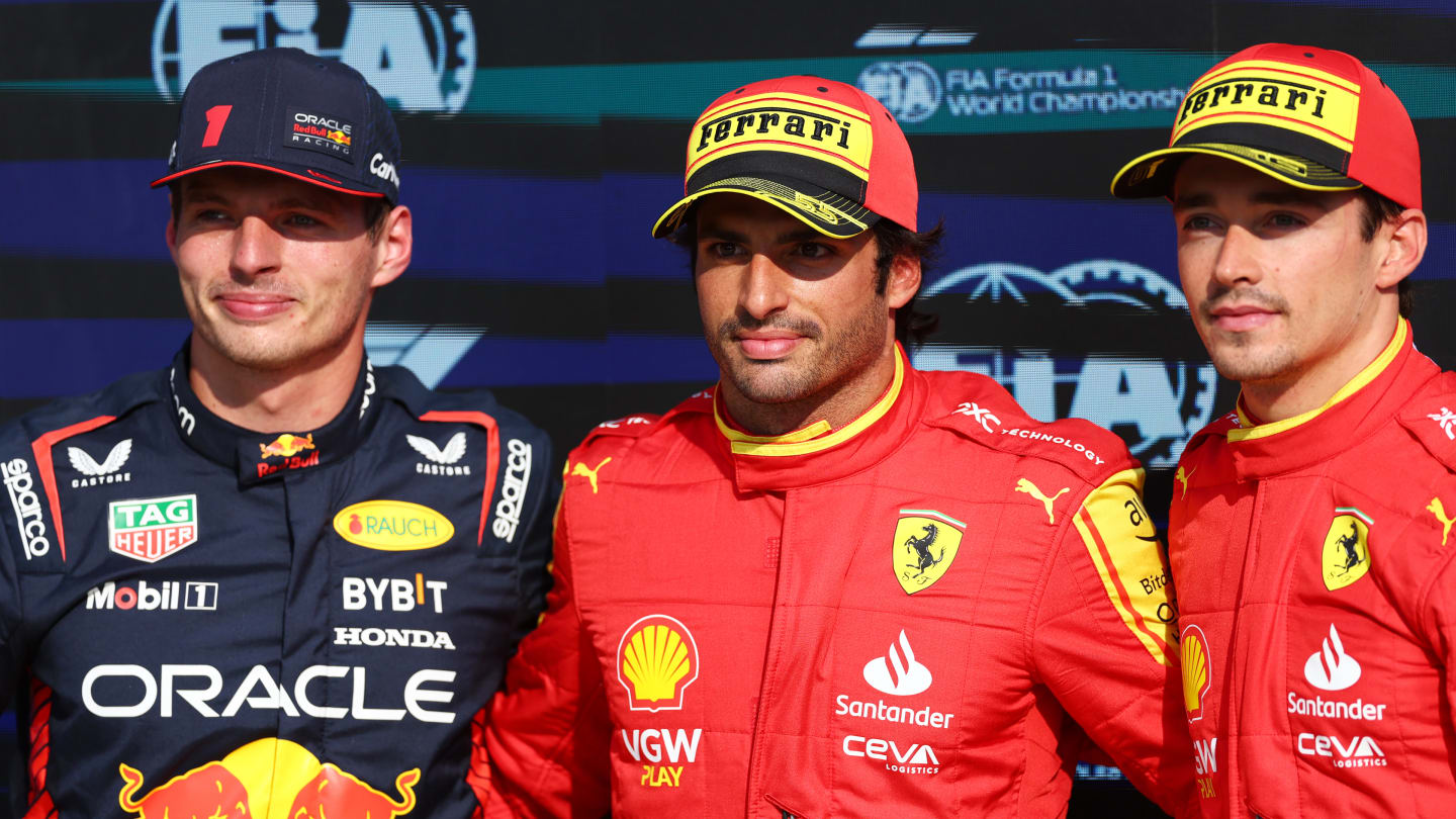 MONZA, ITALY - SEPTEMBER 02: Pole position qualifier Carlos Sainz of Spain and Ferrari, Second placed qualifier Max Verstappen of the Netherlands and Oracle Red Bull Racing and Third placed qualifier Charles Leclerc of Monaco and Ferrari pose for a photo in parc ferme during qualifying ahead of the F1 Grand Prix of Italy at Autodromo Nazionale Monza on September 02, 2023 in Monza, Italy. (Photo by Dan Istitene - Formula 1/Formula 1 via Getty Images)