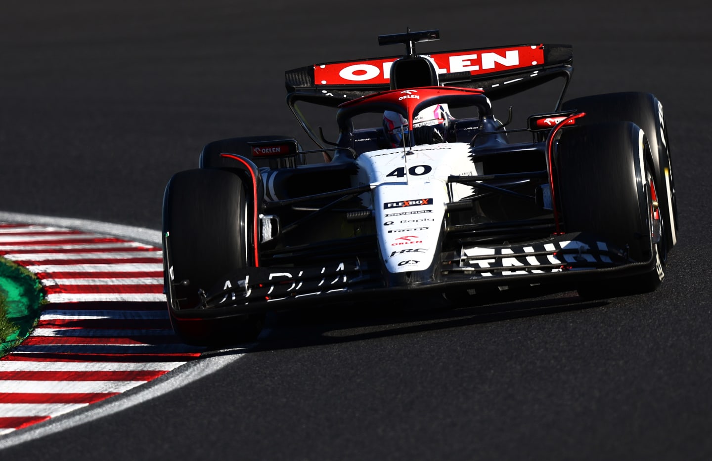 SUZUKA, JAPAN - SEPTEMBER 24: Liam Lawson of New Zealand driving the (40) Scuderia AlphaTauri AT04