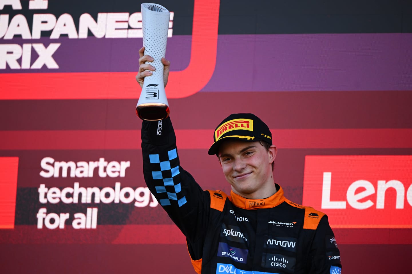 SUZUKA, JAPAN - SEPTEMBER 24: Third placed Oscar Piastri of Australia and McLaren celebrates on the