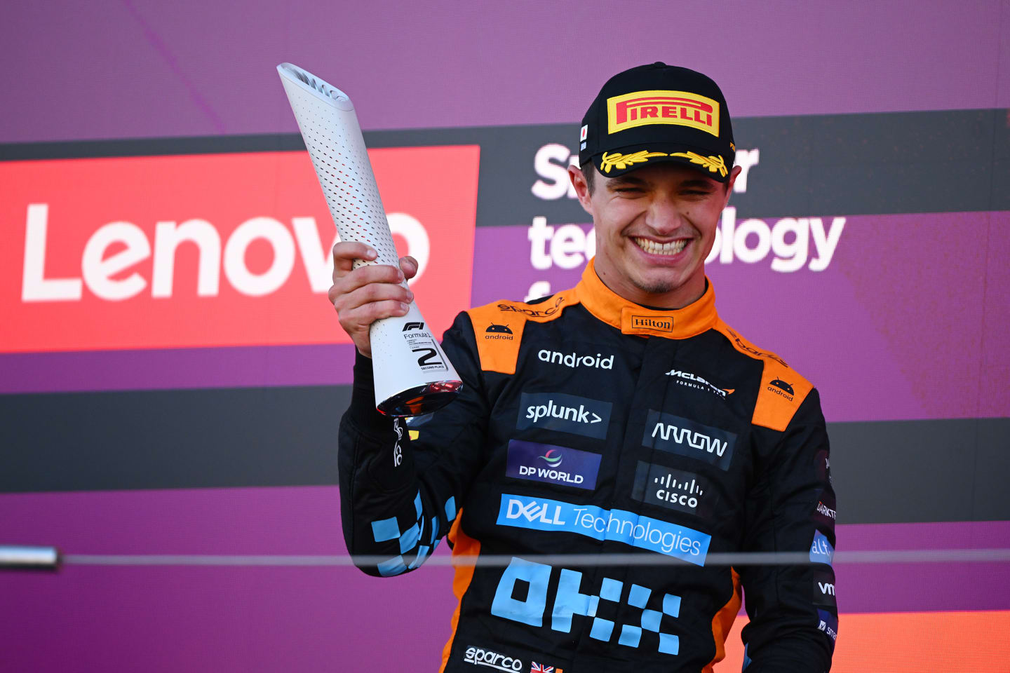 SUZUKA, JAPAN - SEPTEMBER 24: Second placed Lando Norris of Great Britain and McLaren celebrates on the podium during the F1 Grand Prix of Japan at Suzuka International Racing Course on September 24, 2023 in Suzuka, Japan. (Photo by Clive Mason/Getty Images)