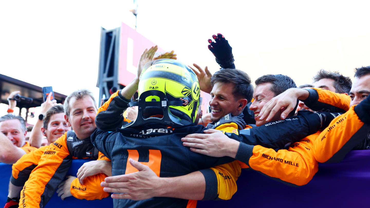 SUZUKA, JAPAN - SEPTEMBER 24: Second placed Lando Norris of Great Britain and McLaren celebrates with his team in parc ferme during the F1 Grand Prix of Japan at Suzuka International Racing Course on September 24, 2023 in Suzuka, Japan. (Photo by Dan Istitene - Formula 1/Formula 1 via Getty Images)