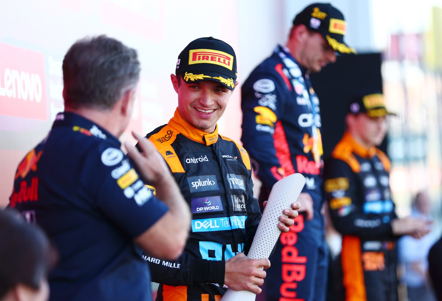 SUZUKA, JAPAN - SEPTEMBER 24: Second placed Lando Norris of Great Britain and McLaren talks with Red Bull Racing Team Principal Christian Horner on the podium during the F1 Grand Prix of Japan at Suzuka International Racing Course on September 24, 2023 in Suzuka, Japan. (Photo by Dan Istitene - Formula 1/Formula 1 via Getty Images)