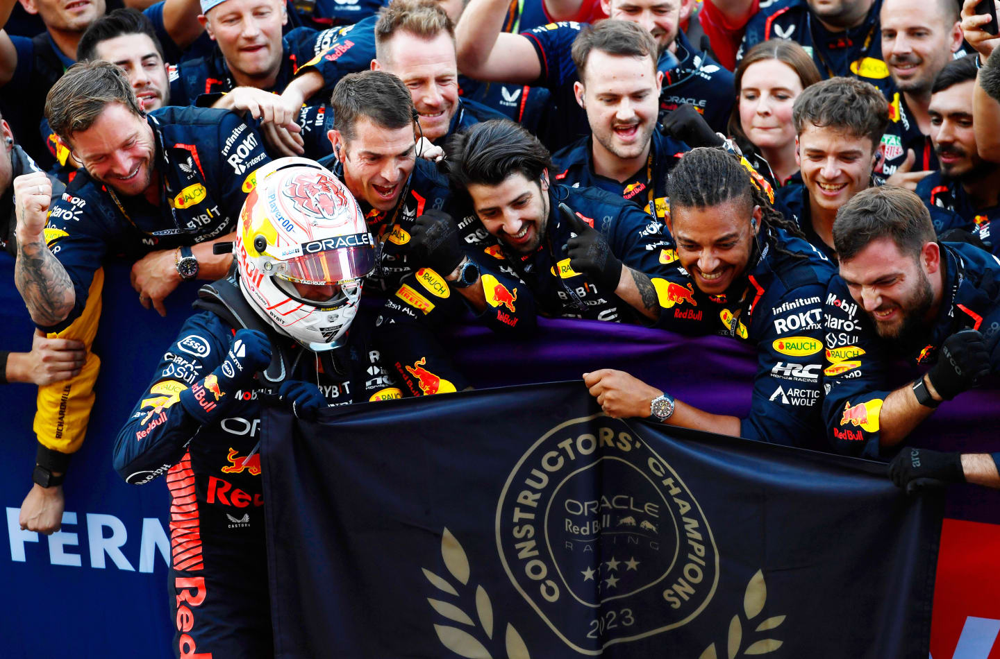 SUZUKA, JAPAN - SEPTEMBER 24: Race winner Max Verstappen of the Netherlands and Oracle Red Bull Racing and his team celebrate their Constructors' Championship win in parc ferme during the F1 Grand Prix of Japan at Suzuka International Racing Course on September 24, 2023 in Suzuka, Japan. (Photo by Rudy Carezzevoli/Getty Images)