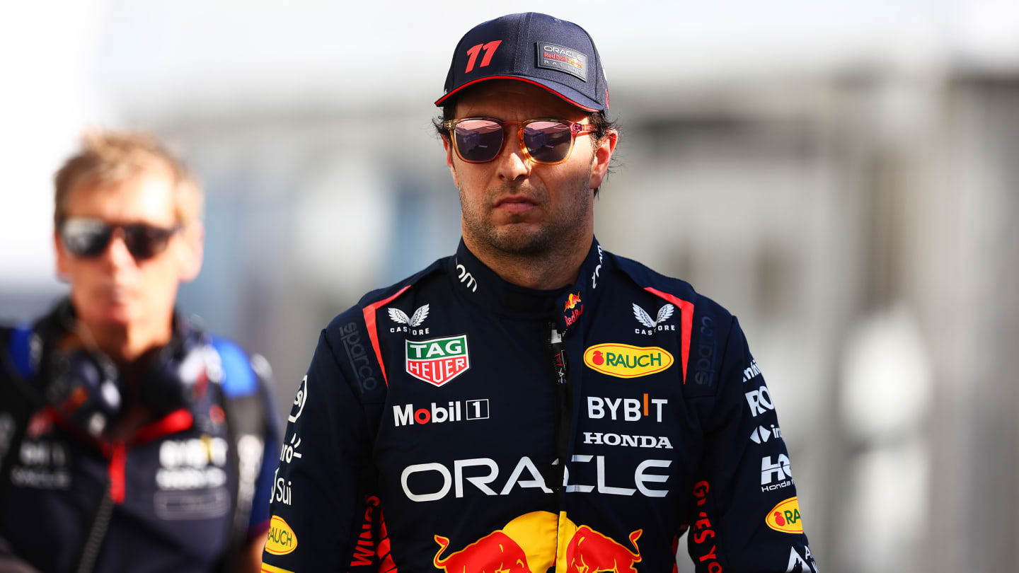 SUZUKA, JAPAN - SEPTEMBER 24: Sergio Perez of Mexico and Oracle Red Bull Racing looks on after