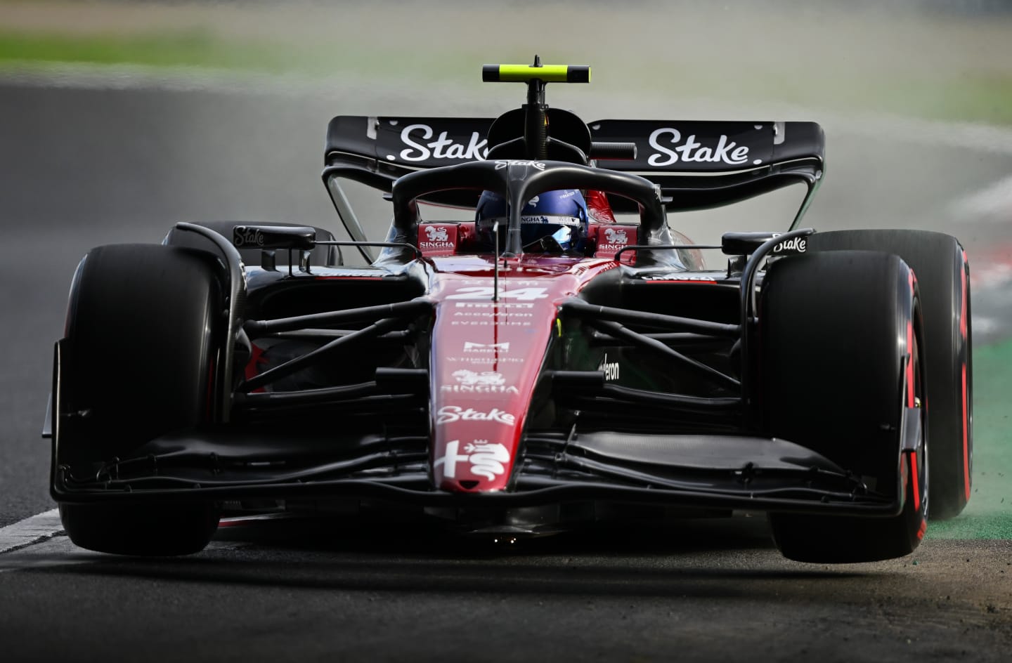 SUZUKA, JAPAN - SEPTEMBER 23: Zhou Guanyu of China driving the (24) Alfa Romeo F1 C43 Ferrari on track during qualifying ahead of the F1 Grand Prix of Japan at Suzuka International Racing Course on September 23, 2023 in Suzuka, Japan. (Photo by Clive Mason/Getty Images)
