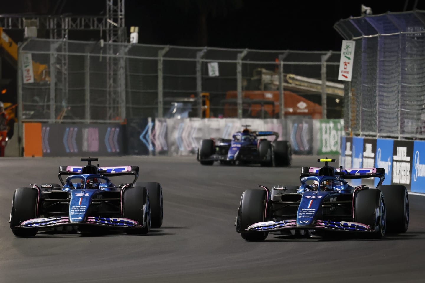 LAS VEGAS, NEVADA - NOVEMBER 18: Esteban Ocon of France driving the (31) Alpine F1 A523 Renault and Pierre Gasly of France driving the (10) Alpine F1 A523 Renault battle for track position on track during the F1 Grand Prix of Las Vegas at Las Vegas Strip Circuit on November 18, 2023 in Las Vegas, Nevada. (Photo by Chris Graythen/Getty Images)