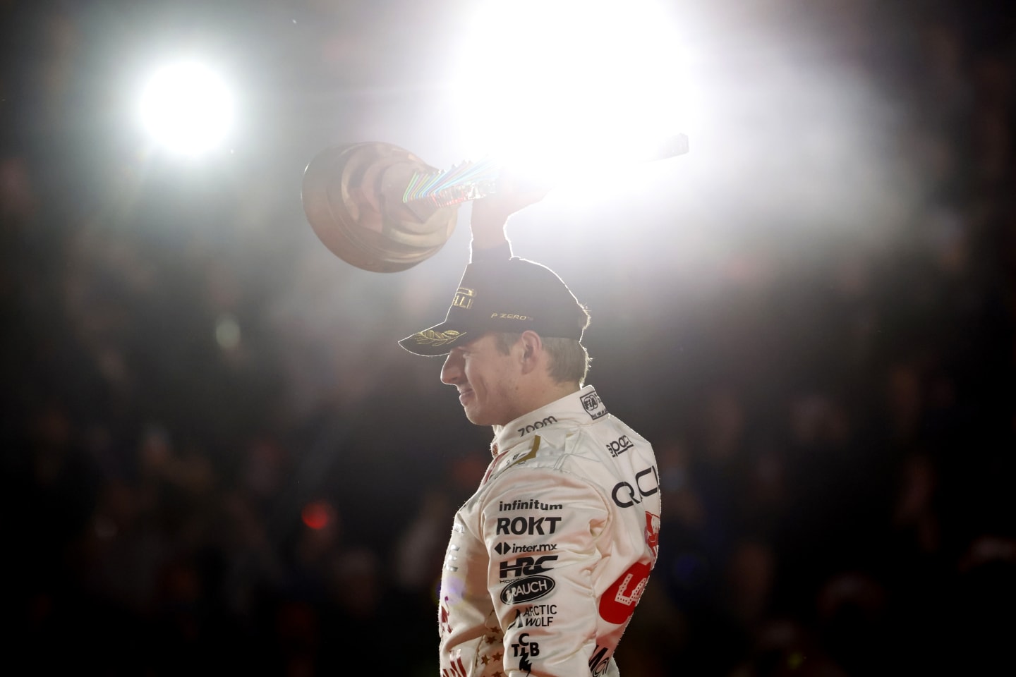 LAS VEGAS, NEVADA - NOVEMBER 18: Race winner Max Verstappen of the Netherlands and Oracle Red Bull Racing celebrates on the podium during the F1 Grand Prix of Las Vegas at Las Vegas Strip Circuit on November 18, 2023 in Las Vegas, Nevada. (Photo by Chris Graythen/Getty Images)