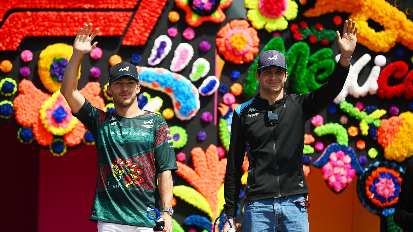 MEXICO CITY, MEXICO - OCTOBER 29: Pierre Gasly of France and Alpine F1 and Esteban Ocon of France and Alpine F1 wave to the crowd on the drivers parade prior to the F1 Grand Prix of Mexico at Autodromo Hermanos Rodriguez on October 29, 2023 in Mexico City, Mexico. (Photo by Clive Mason - Formula 1/Formula 1 via Getty Images)