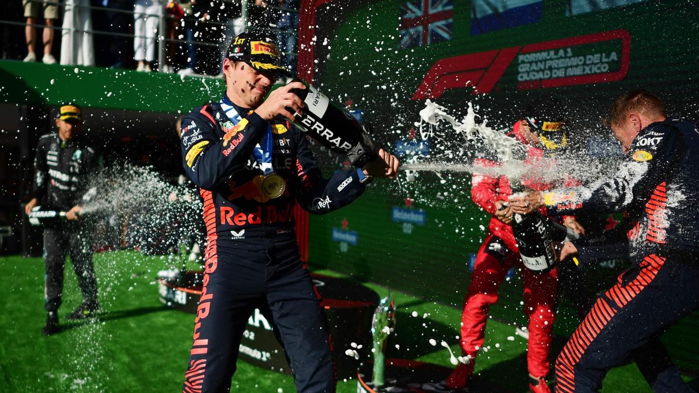 MEXICO CITY, MEXICO - OCTOBER 29: Race winner Max Verstappen of the Netherlands and Oracle Red Bull Racing, Second placed Lewis Hamilton of Great Britain and Mercedes and Third placed Charles Leclerc of Monaco and Ferrari celebrate on the podium after the F1 Grand Prix of Mexico at Autodromo Hermanos Rodriguez on October 29, 2023 in Mexico City, Mexico. (Photo by Mario Renzi - Formula 1/Formula 1 via Getty Images)