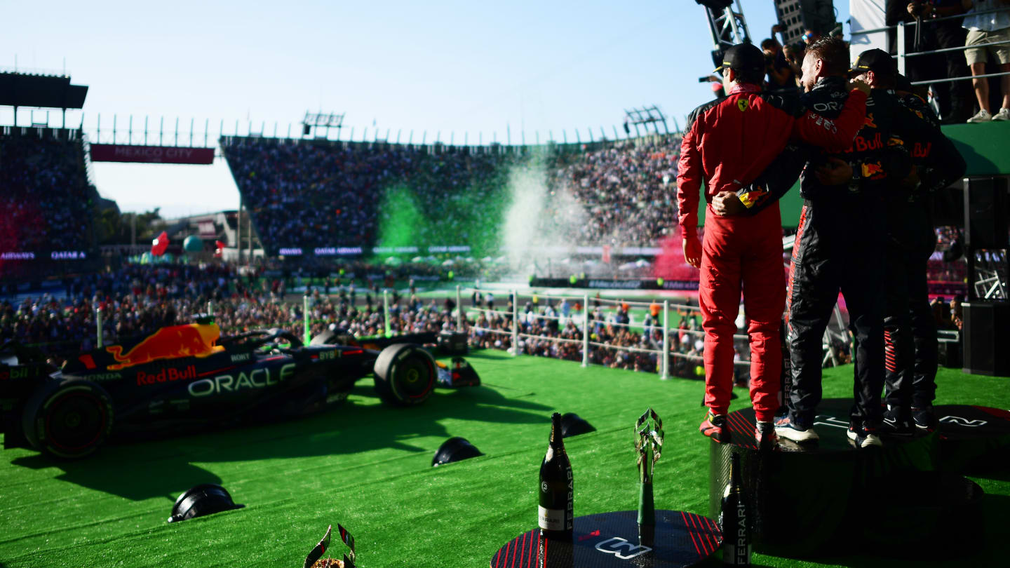 MEXICO CITY, MEXICO - OCTOBER 29: Race winner Max Verstappen of the Netherlands and Oracle Red Bull Racing, Second placed Lewis Hamilton of Great Britain and Mercedes, Third placed Charles Leclerc of Monaco and Ferrari  and Richard Wolverson of Red Bull Racing celebrate on the podium after the F1 Grand Prix of Mexico at Autodromo Hermanos Rodriguez on October 29, 2023 in Mexico City, Mexico. (Photo by Mario Renzi - Formula 1/Formula 1 via Getty Images)