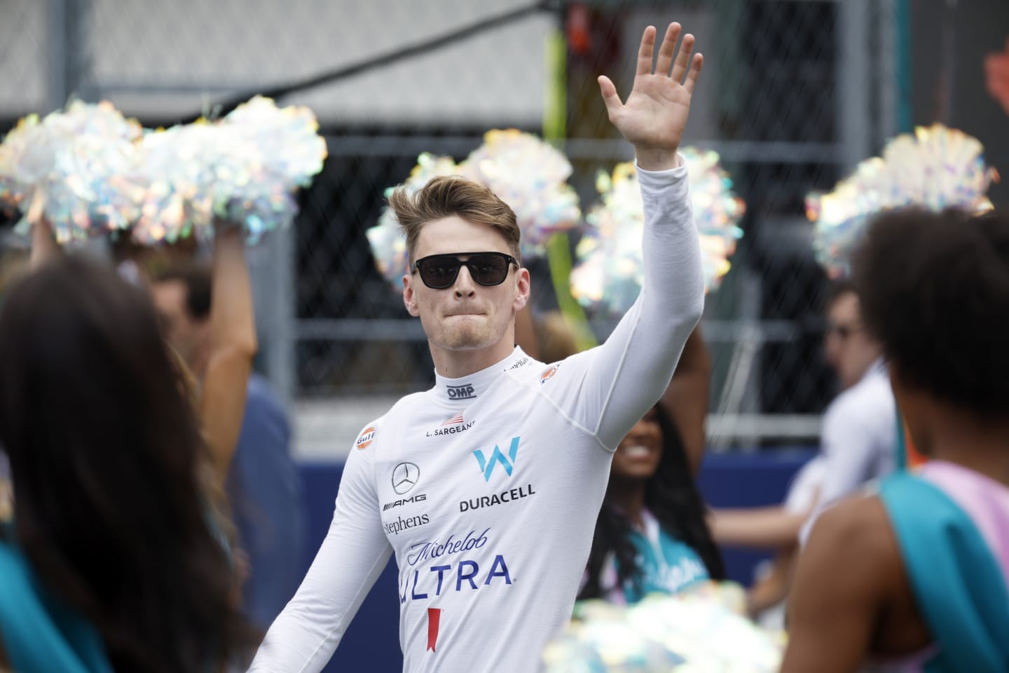 MIAMI, FLORIDA - MAY 07: Logan Sargeant of United States and Williams waves to the crowd from the grid prior to the F1 Grand Prix of Miami at Miami International Autodrome on May 07, 2023 in Miami, Florida. (Photo by Jared C. Tilton/Getty Images)