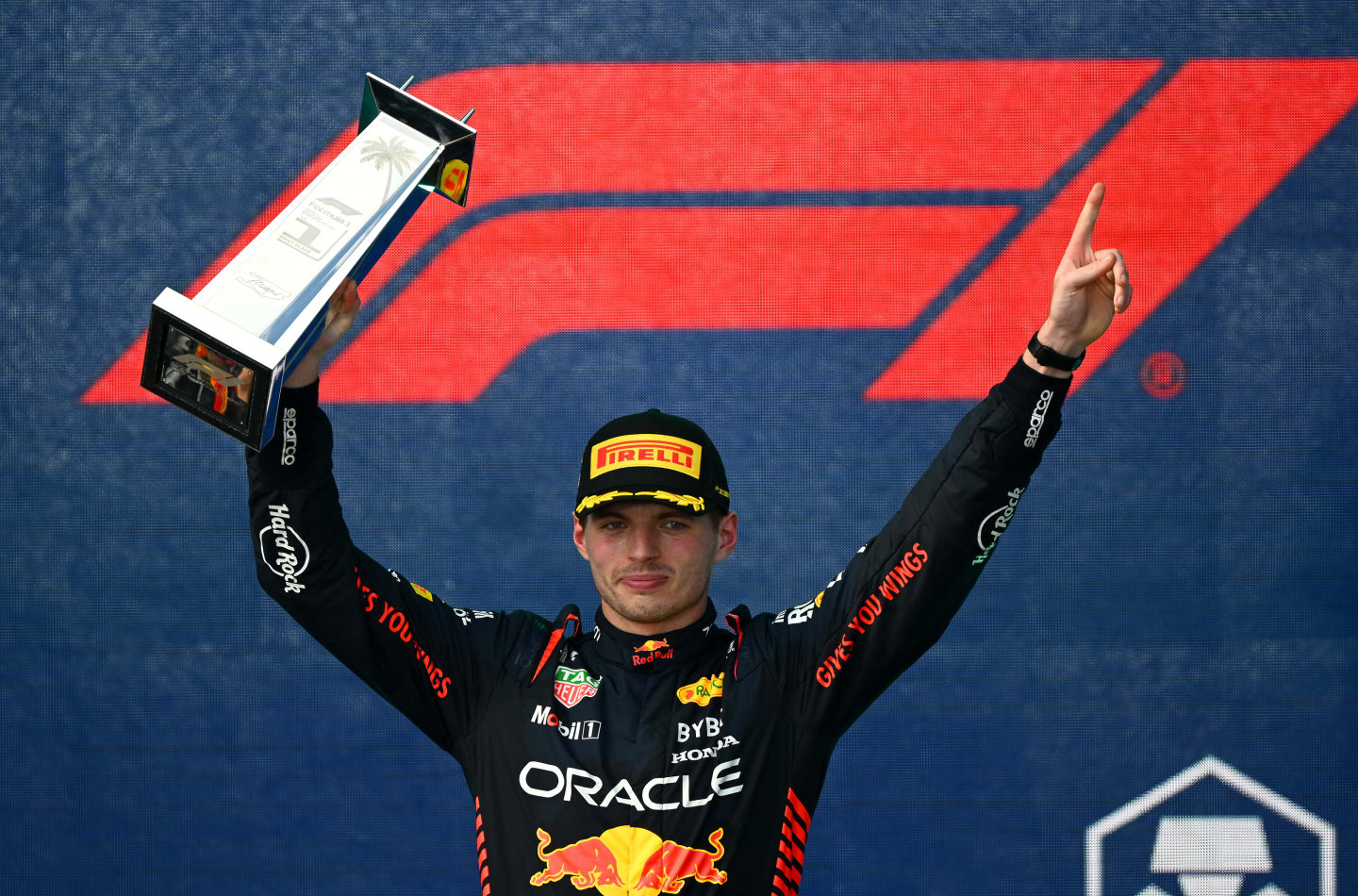 MIAMI, FLORIDA - MAY 07: Race winner Max Verstappen of the Netherlands and Oracle Red Bull Racing celebrates on the podium during the F1 Grand Prix of Miami at Miami International Autodrome on May 07, 2023 in Miami, Florida. (Photo by Clive Mason - Formula 1/Formula 1 via Getty Images)