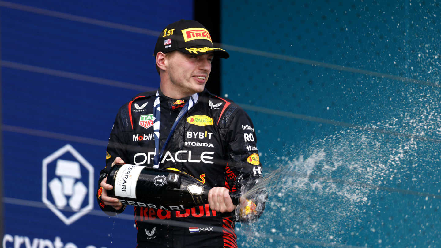 MIAMI, FLORIDA - MAY 07: Race winner Max Verstappen of the Netherlands and Oracle Red Bull Racing celebrates on the podium during the F1 Grand Prix of Miami at Miami International Autodrome on May 07, 2023 in Miami, Florida. (Photo by Chris Graythen/Getty Images)