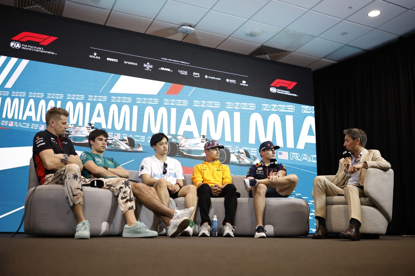 MIAMI, FLORIDA - MAY 04: The Drivers Press Conference with Nico Hulkenberg of Germany and Haas F1, Lance Stroll of Canada and Aston Martin F1 Team, Zhou Guanyu of China and Alfa Romeo F1, Lando Norris of Great Britain and McLaren and Max Verstappen of the Netherlands and Oracle Red Bull Racing during previews ahead of the F1 Grand Prix of Miami at Miami International Autodrome on May 04, 2023 in Miami, Florida. (Photo by Jared C. Tilton/Getty Images)