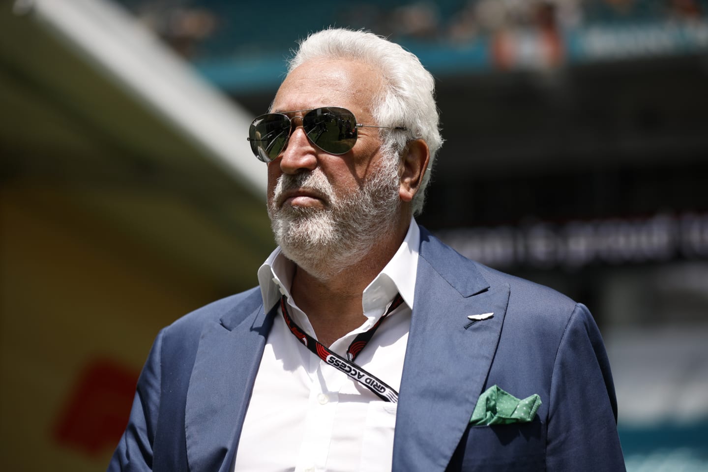 MIAMI, FLORIDA - MAY 06: Owner of Aston Martin F1 Team Lawrence Stroll walks in the Paddock prior