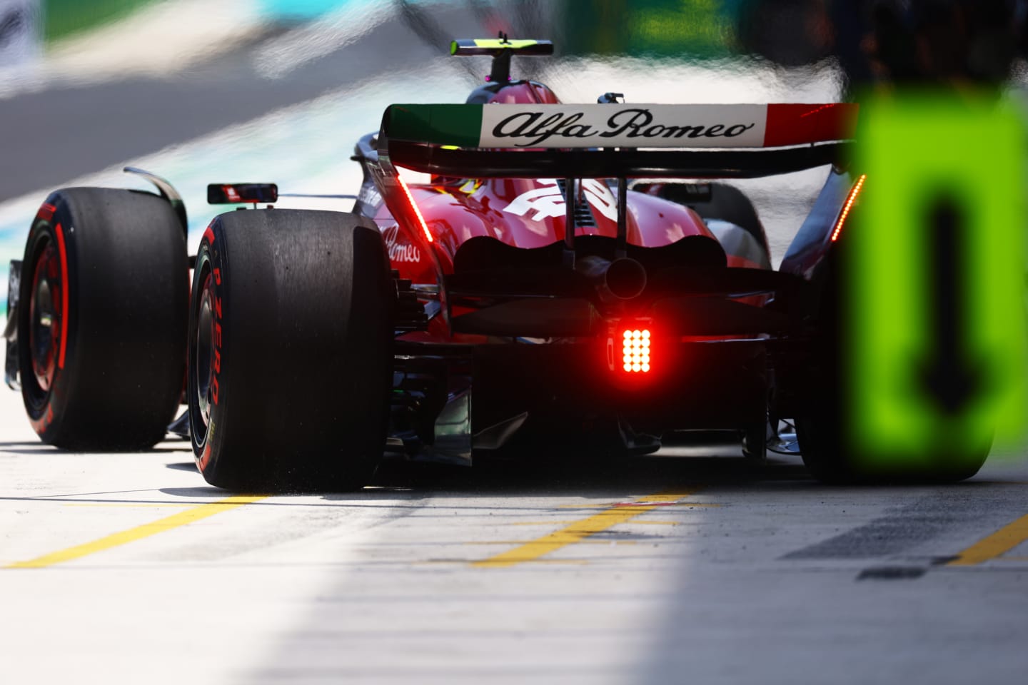 MIAMI, FLORIDA - MAY 06: Zhou Guanyu of China driving the (24) Alfa Romeo F1 C43 Ferrari makes a pitstop during final practice ahead of the F1 Grand Prix of Miami at Miami International Autodrome on May 06, 2023 in Miami, Florida. (Photo by Mark Thompson/Getty Images)