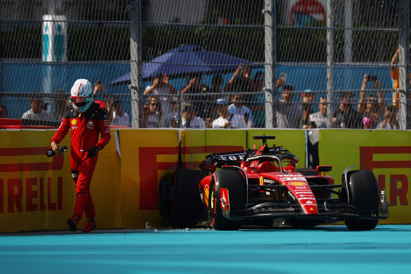 MIAMI, FLORIDA - MAY 06: Charles Leclerc of Monaco and Ferrari walks from his car after crashing during qualifying ahead of the F1 Grand Prix of Miami at Miami International Autodrome on May 06, 2023 in Miami, Florida. (Photo by Jared C. Tilton/Getty Images)